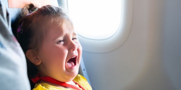 AITA: Crying Toddler on Plane Wants Cocomelon