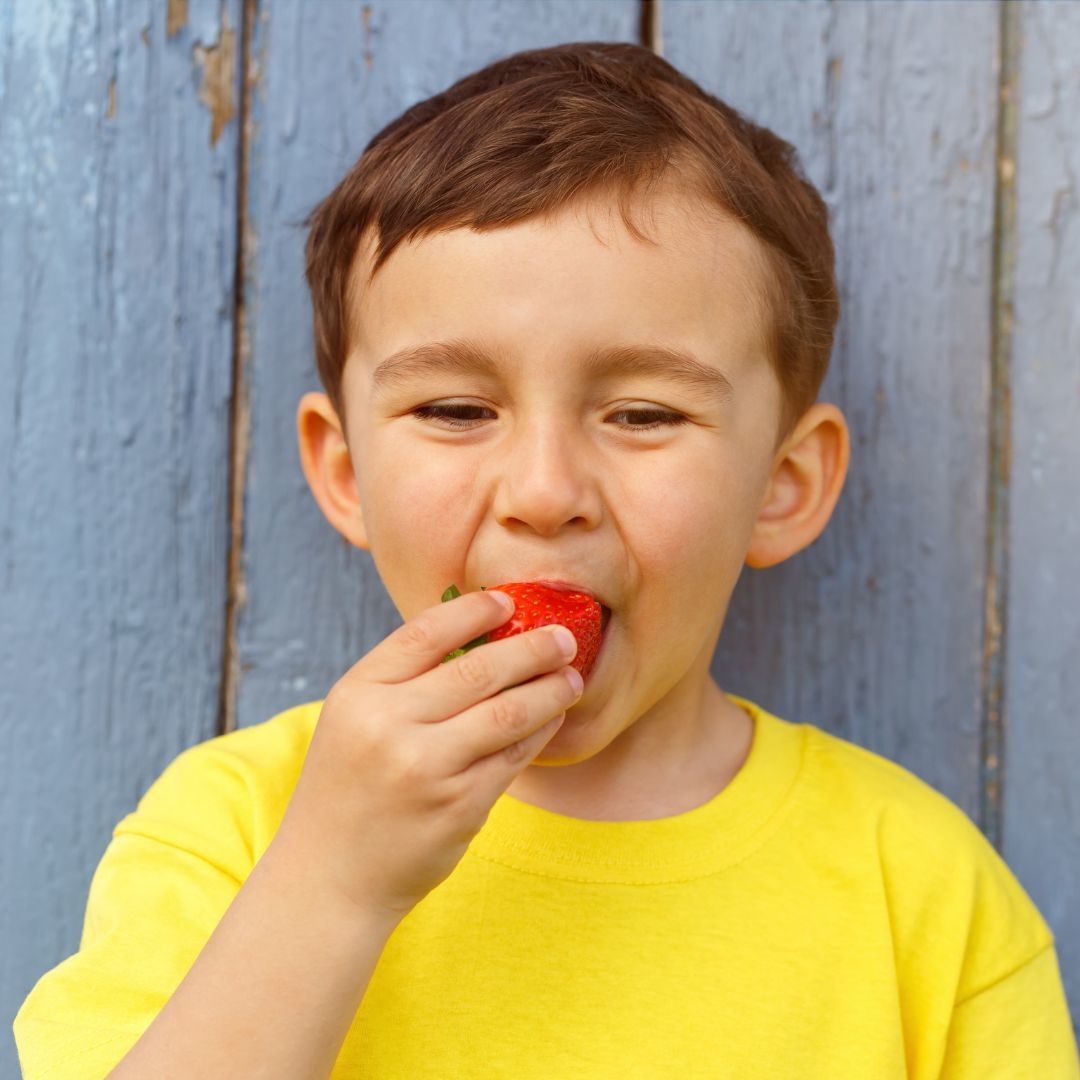 child-fruit-stock-image